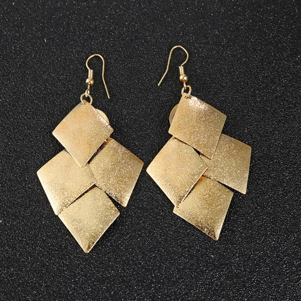 Gold tone diamond shaped earrings